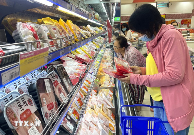 TP. HCM tăng nguồn cung, ổn định giá thịt heo dịp Tết (Ảnh: Hương Giang/TTXVN)